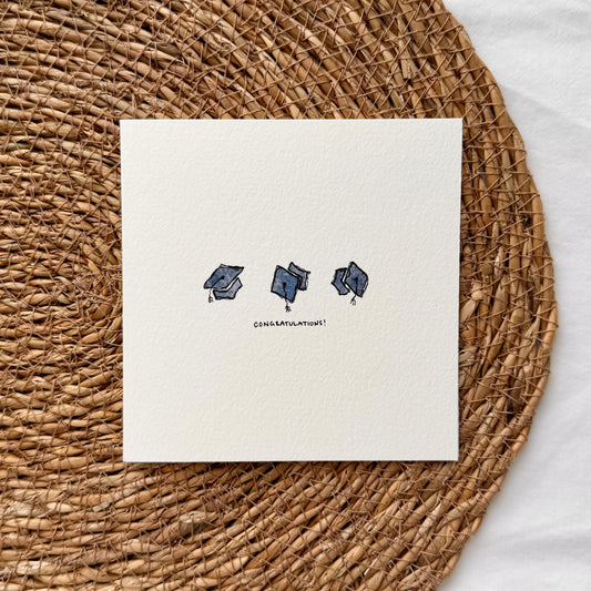 Tossed Caps Card
